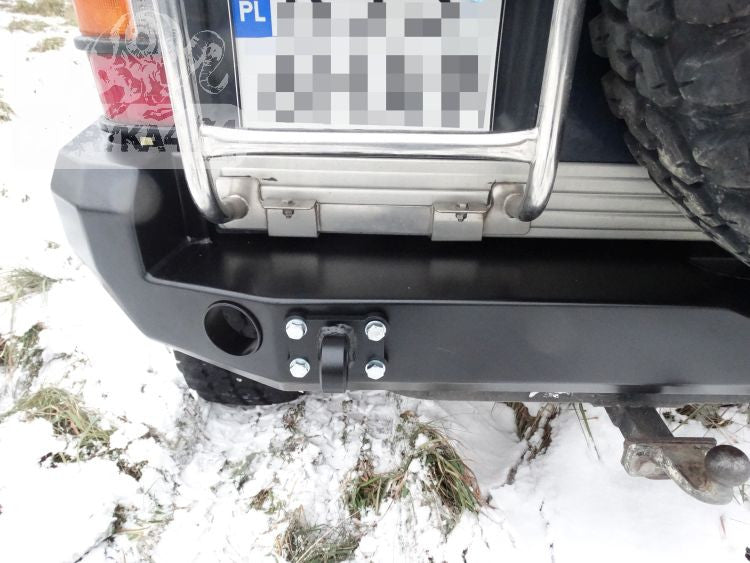 Rear bumper, short version with flares Mitsubishi Pajero II 91-99